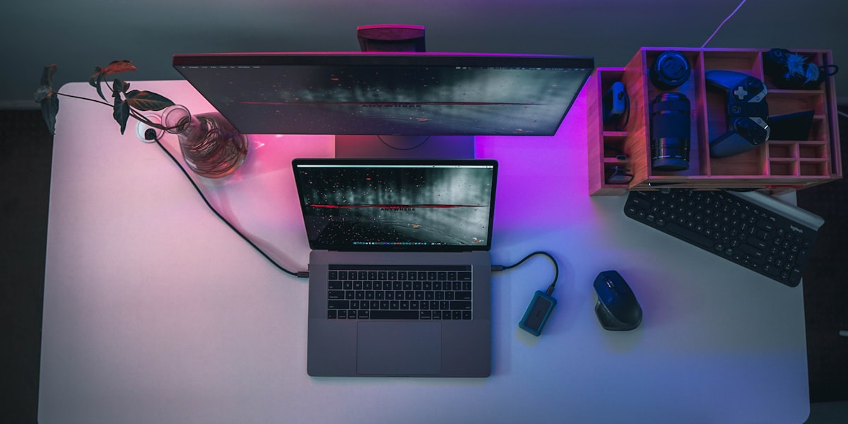 Laptop on a minimal desk representing secure documentation workflow