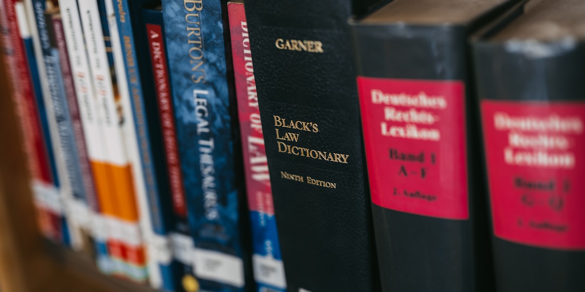 Law books lined up on a shelf
