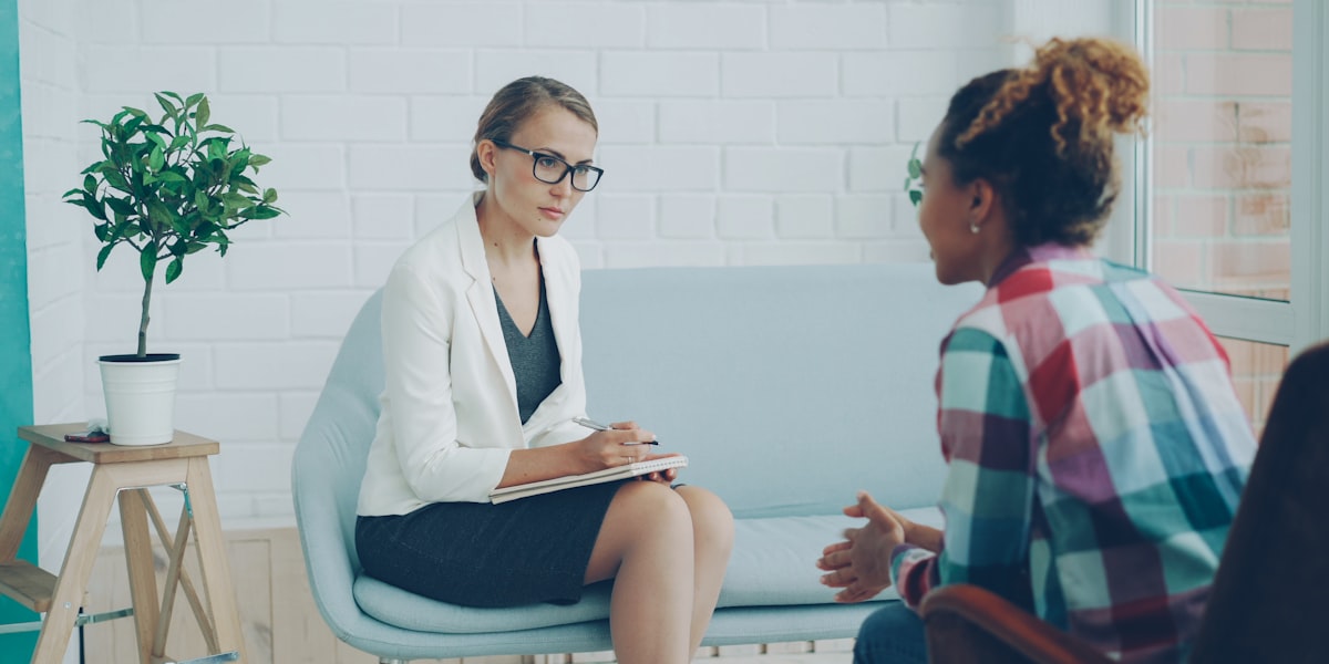 Healthcare provider documenting patient notes